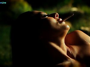 super-hot Sandra Romain smokes a ciggy and masturbates